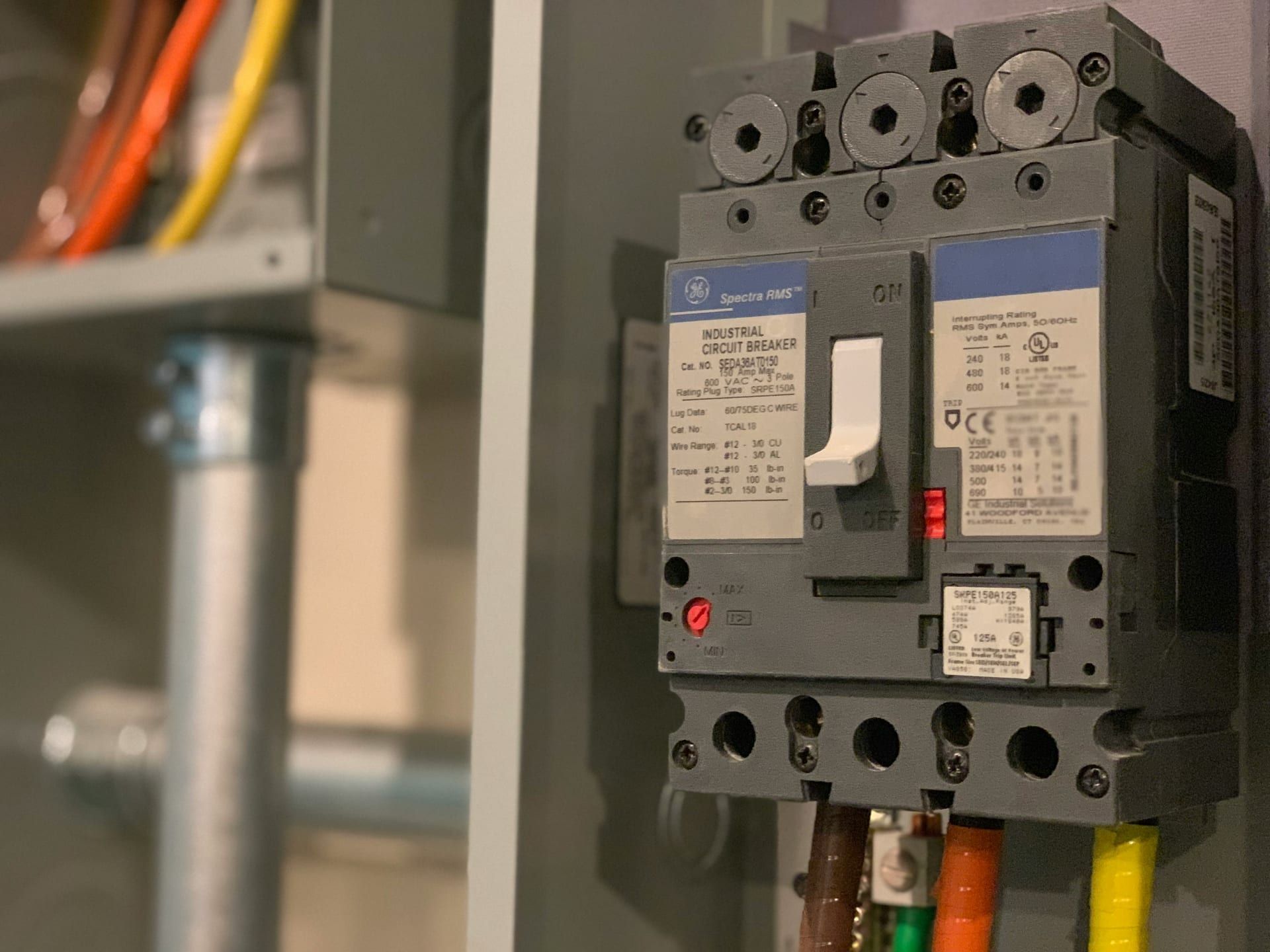 An automatic transfer switch mounted between the meter and the panel